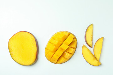 Ripe mango fruit on white background, top view