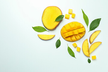 Ripe mango fruit on white background, top view