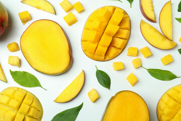Ripe mango fruits on white background, top view
