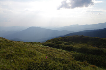 Mountain panoramic landscape with clouds and blue sky
