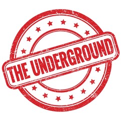 THE UNDERGROUND text on red grungy round rubber stamp.