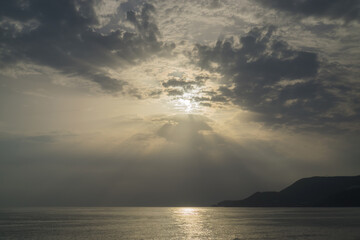 Evening sea and beach, sunset over Cleopatra beach in Alanya.