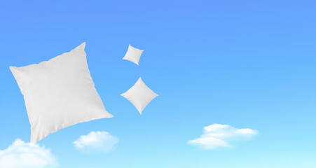 Flying pillows against the blue sky. Interesting idea Mockup Blank white square pillow cotton.