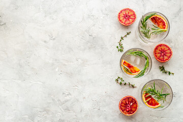Summer cocktails with blood orange grapefruit and ice. Top view