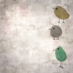 stylish textured old paper background with funny little birds made of sea glass pebble pieces 
