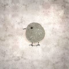stylish textured old paper background with funny little birds made of sea glass pebble pieces 
