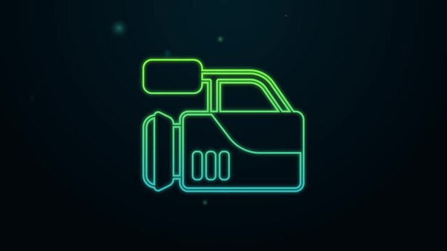 Glowing neon line Cinema camera icon isolated on black background. Video camera. Movie sign. Film projector. 4K Video motion graphic animation