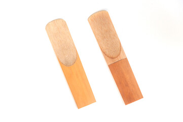 close-up saxophone reeds isolated on a white background