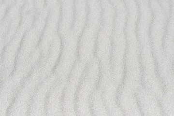 Fototapeta na wymiar Background photo of sand on a beach