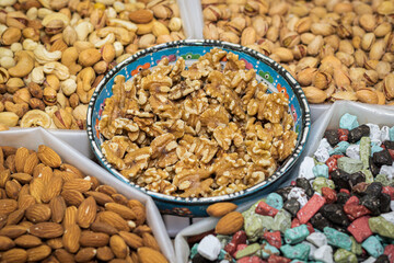 Walnuts and other nuts on sale at a market in Oman