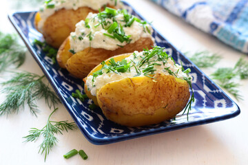 Baked potatoes with cottage cheese paste called 