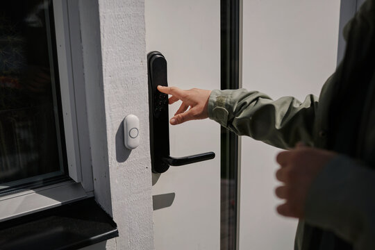 Woman using keyless door lock