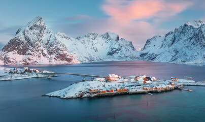 view from above to Sakrisøya Island with mountains on background at sunrise - Lofoten Islands, Norway. Europe
