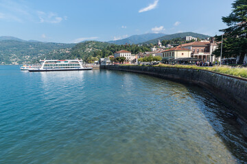 Lake Maggiore, Italy. Lakeside of the town of Luino with tourist ferry
