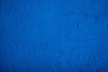 Textured embossed dark blue background