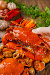 Delicious Crab in Padang sauce or Padang crab is an Indonesian seafood dish of crab served in hot and spicy Padang sauce. 