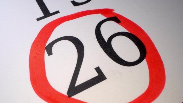 Deadline Date definition 26. Marking the date in the calendar with a red marker. The twenty-sixth 26 day of the month