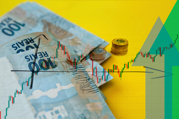 coins and money on yellow surface and arrows indicating time and earnings growth