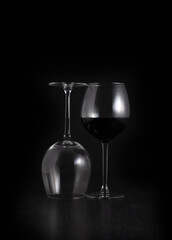 Obraz na płótnie Canvas wine glasses shot against a black background