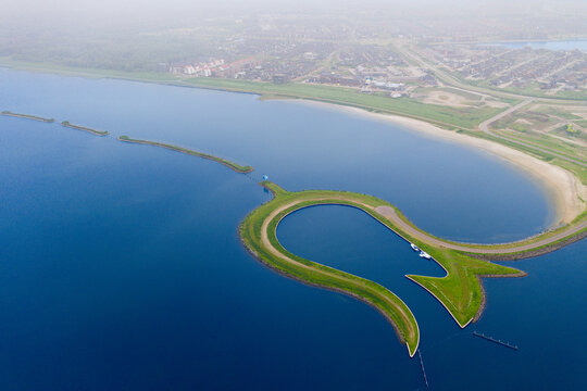 Aerial view from the drone of manmade Tulip island Tulpeiland Zeewolde, Netherlands.