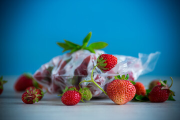 frozen fresh strawberries in a vacuum bag