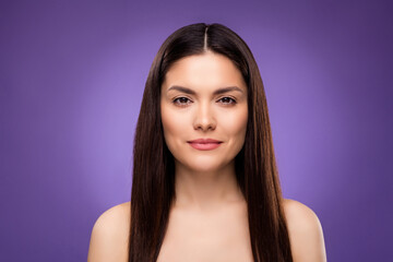 Portrait of attractive woman perfect flawless clean skin isolated over bright violet purple color background