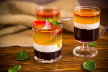 lot of colored sweet fruit jelly in a glass