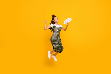 Full body profile side photo of young afro girl happy positive smile jump hold cash dollars rich...