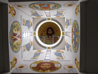 Up view to the Christ on a greek orthodox church ceiling 