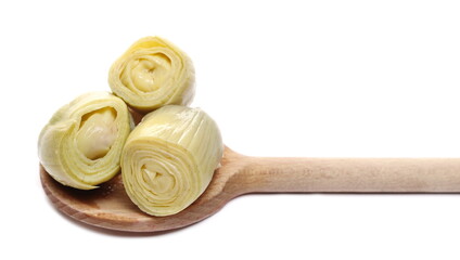 Artichoke in wooden spoon isolated on white background