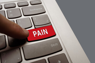 Finger hits a red pain button. the problem of chronic pain and fibromyalgia.
