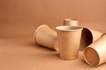 Zero waste. A lot of disposable paper cups. Coffee and ecology. Beige background