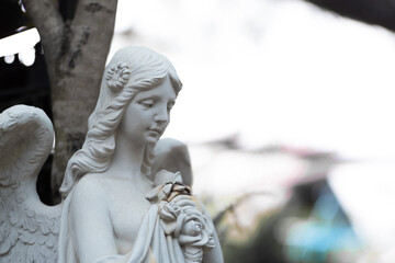 A statue of a goddess that is both beautiful and cute.