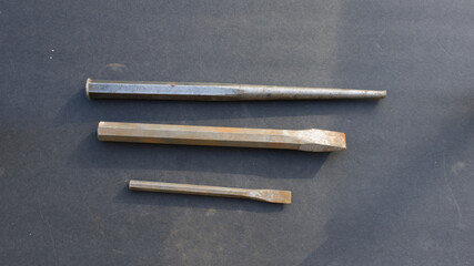 A Punch and two chisels