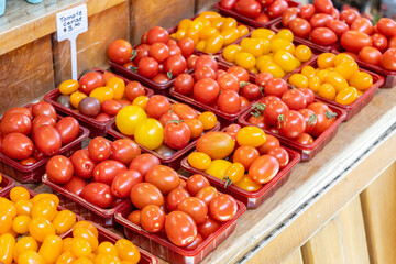 Cherry tomatoes on sale on a summer market