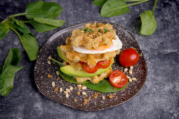 Waffle burger with egg, Breakfast on a dark background