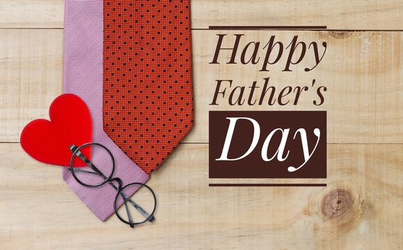 Father's day concept idea background, Necktie with eyeglasses and red heart on wood background