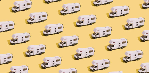 Pattern of a toy van on a yellow background. Minimalistic summer family vacation, staycations...