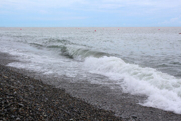 Waves on the sea coast. Before the storm. Dagomys village, Sochi, Russia.