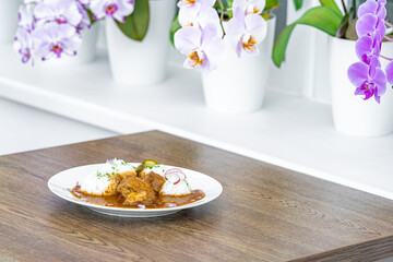 cruel meat with rice and sauce