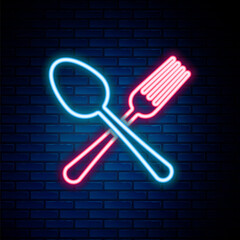 Glowing neon line Crossed fork and spoon icon isolated on brick wall background. Cooking utensil. Cutlery sign. Colorful outline concept. Vector © vector_v