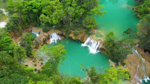 Aerial: tropical Cascadas de Roberto Barrios waterfall in Mexico rainforest