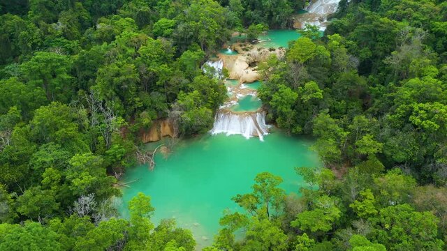 Beautiful Cascadas de Roberto Barrios waterfall in Mexico, 4K aerial arc shot