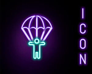 Glowing neon line Parachute and silhouette person icon isolated on black background. Colorful outline concept. Vector