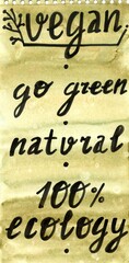 lettering vegan, go green, natural, 100 % ecology isolated on a green background