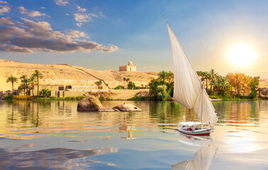 The Nile and traditional African village near Aswan, Egypt