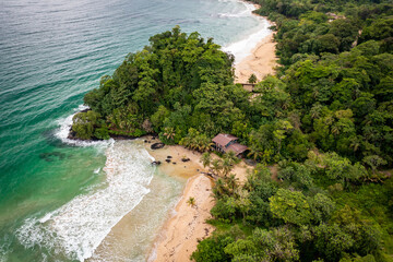 Tropical Island Aerial View. Wild coastline lush exotic green jungle. Red Frog Beach in Bastimentos...