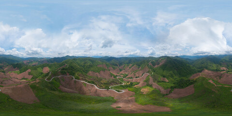 360 panorama by 180 degrees angle seamless panorama of aerial view of cars driving on curved,...