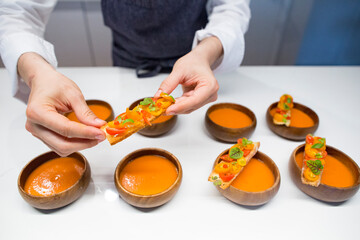 chef preparing gazpacho and healthy appetizers