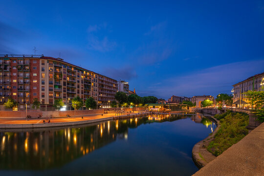 Darsena Naviglio Grande  at the evening.when the lights of the city and the bars come on and the nightlife of Milan begins, Milan, Italy.